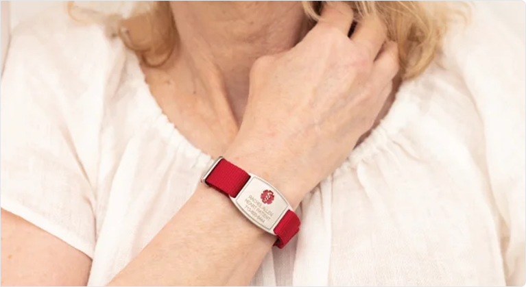 Woman wearing American Medical ID bracelet