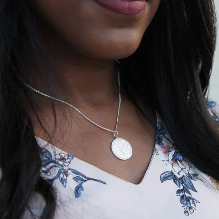 Sterling silver hot sale medallion necklace